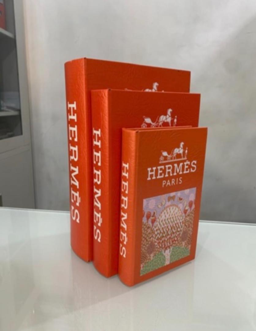 Decorative books styled in orange